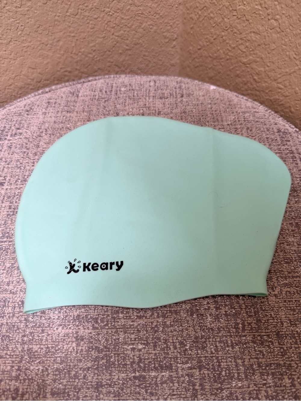 🔹Keary swim cap in a pastel green